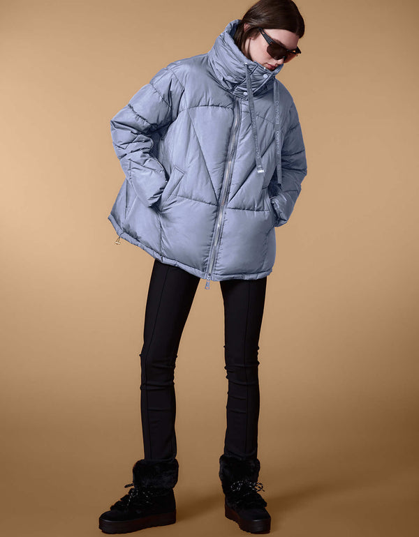 chic and trendy hooded puffer coat in blue with welted pockets in mid length designed for maximum movement and comfort