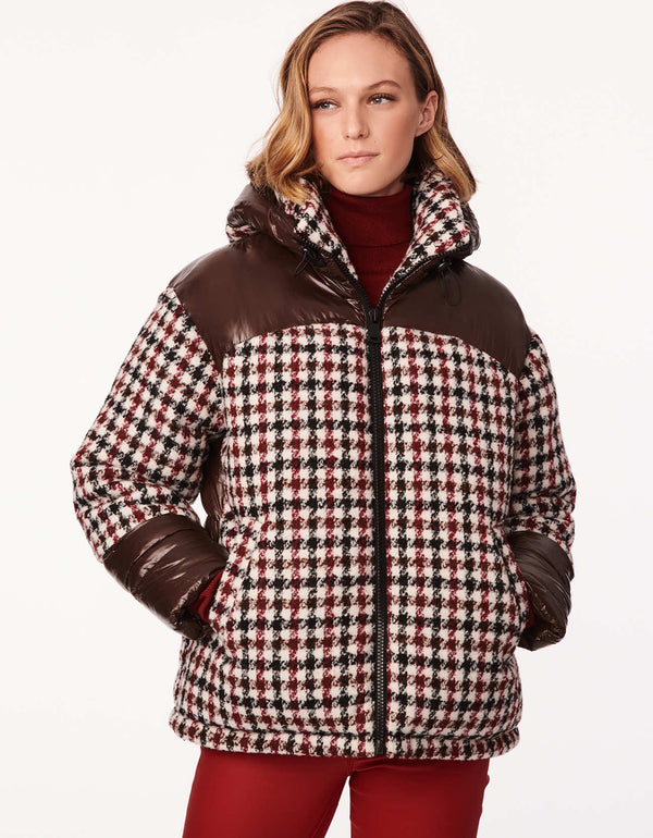 stylishly chic and extra cozy brown and red houndstooth apres ski puffer jacket for women