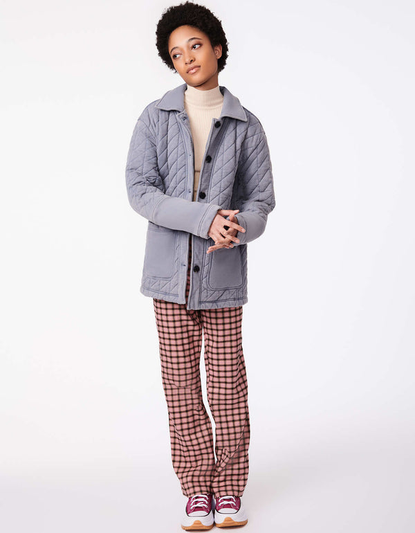 oversized dusty blue color winter jacket with patch pockets and button up styling as winter outfit for women