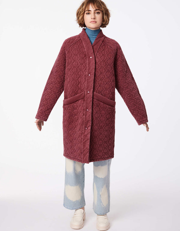 long lightweight winter coat with playful pattern for working women