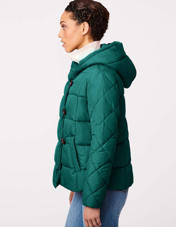 green puffer outerwear that will make you stay warm and dry during fall and winter seasons