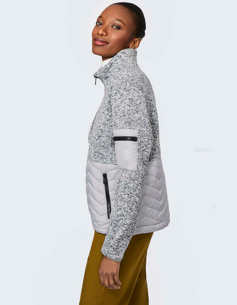 embrace comfort and style in this oversized hip length puffer jacket for women
