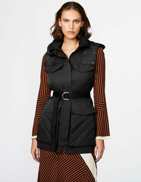 make a statement with this roomier fit cargo safari vest for women with d ring belt and snap front closure