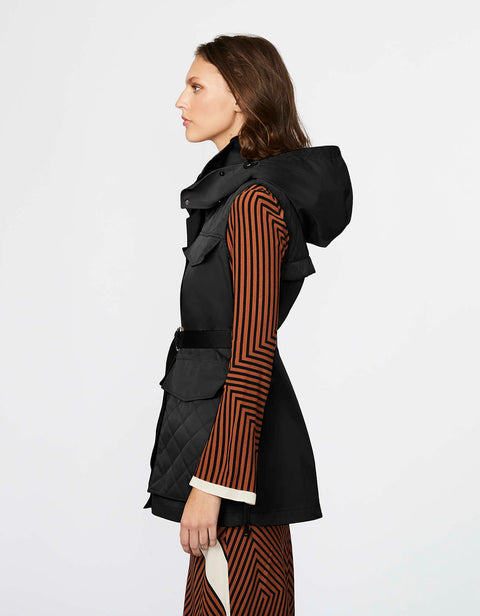 versatile mid length safari vest with chest and front flap pockets that is also perfect for layering