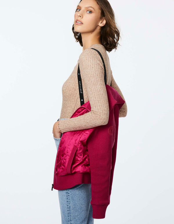 stay cozy and stylish in this fitted hip length reddish pink puffer sweater for women