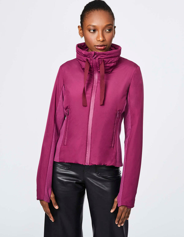 ergonomically sleek puffer jacket in reddish pink color perfect for multi season wear