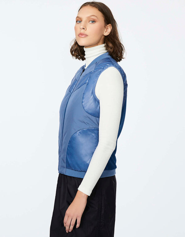 classic fit blue puffer vest with glossy bands and hand pockets for convenience