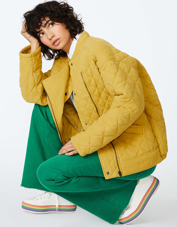 cozy yellow car jacket with diamond quilted coverage that would not weigh down your style