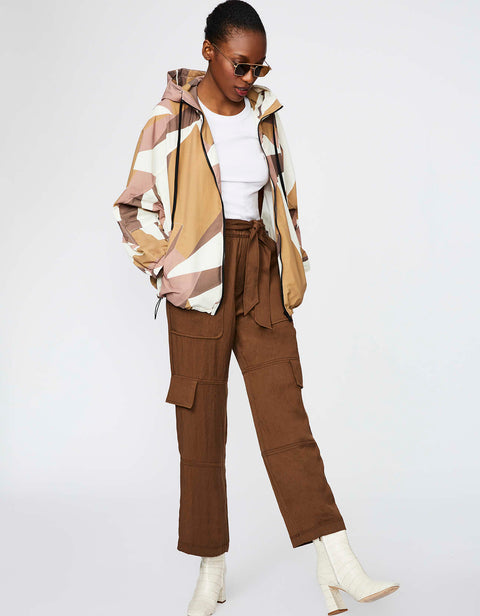 oversize hooded shell jacket for versatile protection in abstract windward design