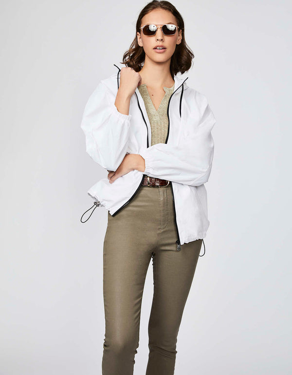 hip length white shell jacket designed for rainy and windy days