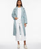 long belted raincoat for women with trench coat design and houndstooth print