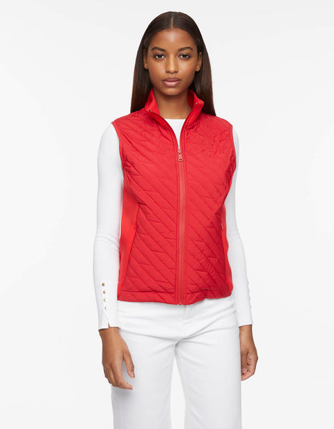 attractive red puffer vest that can be worn through fall to winter with neoprene side panels 