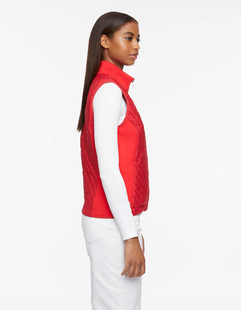 puffer vest for women this winter and fall season that has a red color and concealed zips for that chic and stylish look